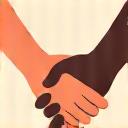 Two hands shaking, representing community connection